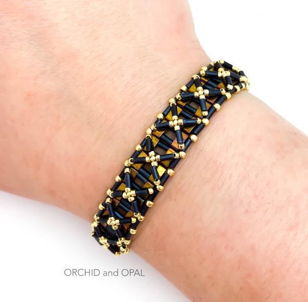 half nexus bracelet black gold