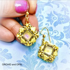 cutting corners earrings tan
